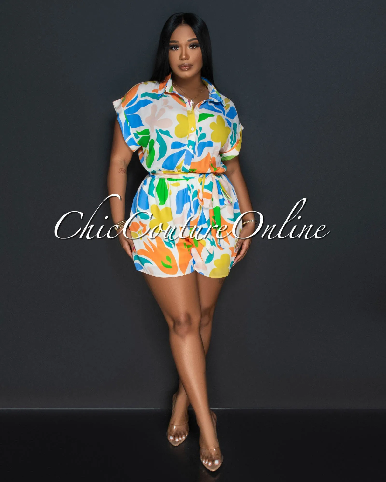 *Thena Cream Multi-Color Print Utility Romper sold by Chic Couture