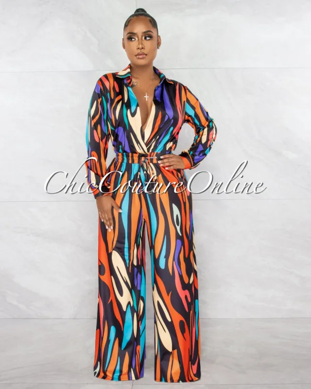 Camryn Black Multi-Color Retro Print Deep V-Neck Jumpsuit sold by Chic Couture