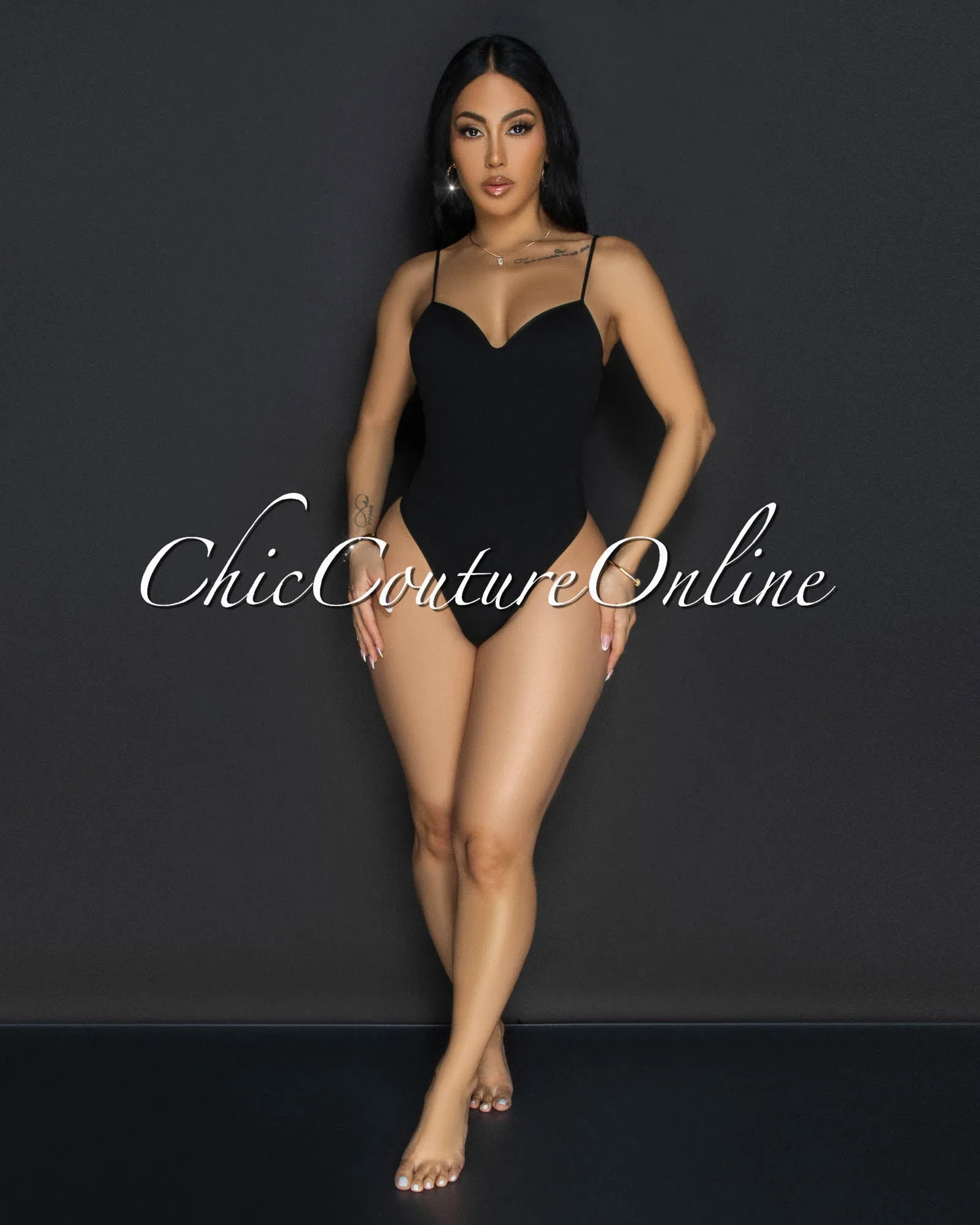 Toniya Black Ribbed Body-Con Bodysuit sold by Chic Couture