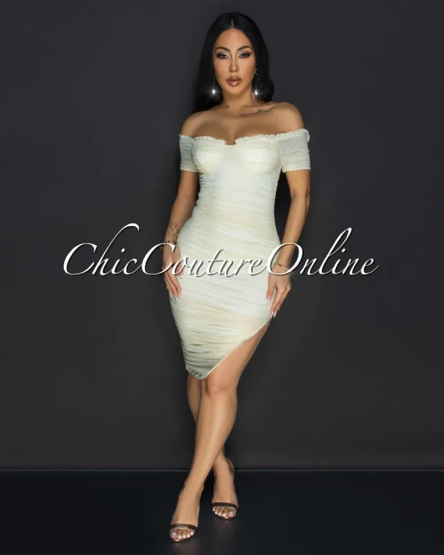 *Linna Cream Ruched Off-The Shoulder Dress sold by Chic Couture