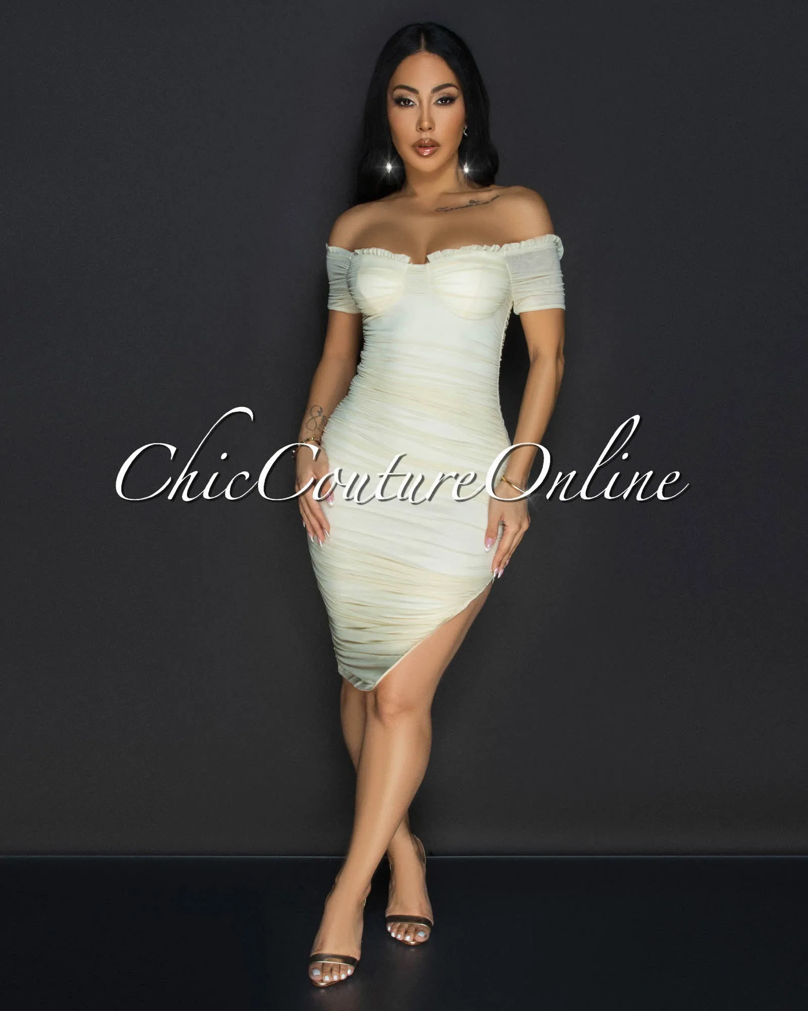 *Linna Cream Ruched Off-The Shoulder Dress sold by Chic Couture