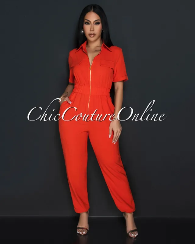 Sumi Orange Utility Cargo Jumpsuit sold by Chic Couture