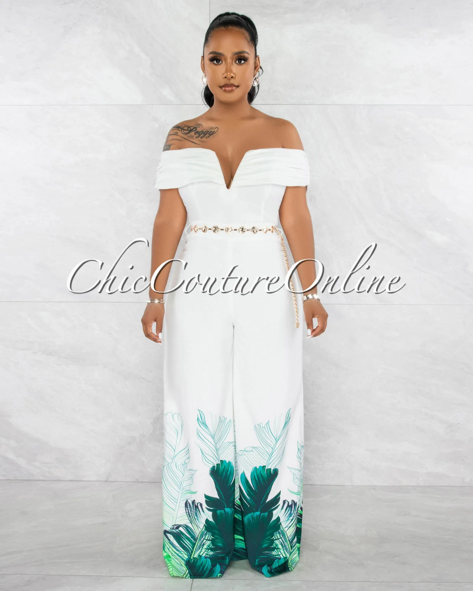*Jaunie Off-White Green Leaf Print Gold Link Belt Jumpsuit sold by Chic Couture