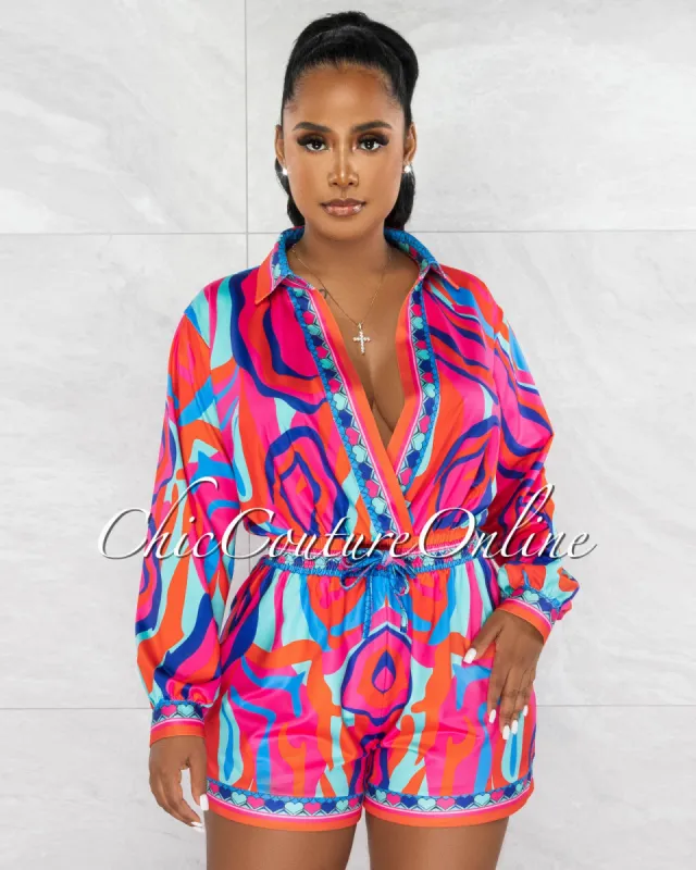 *Pierre Fuchsia Multi-Color Print Romper sold by Chic Couture
