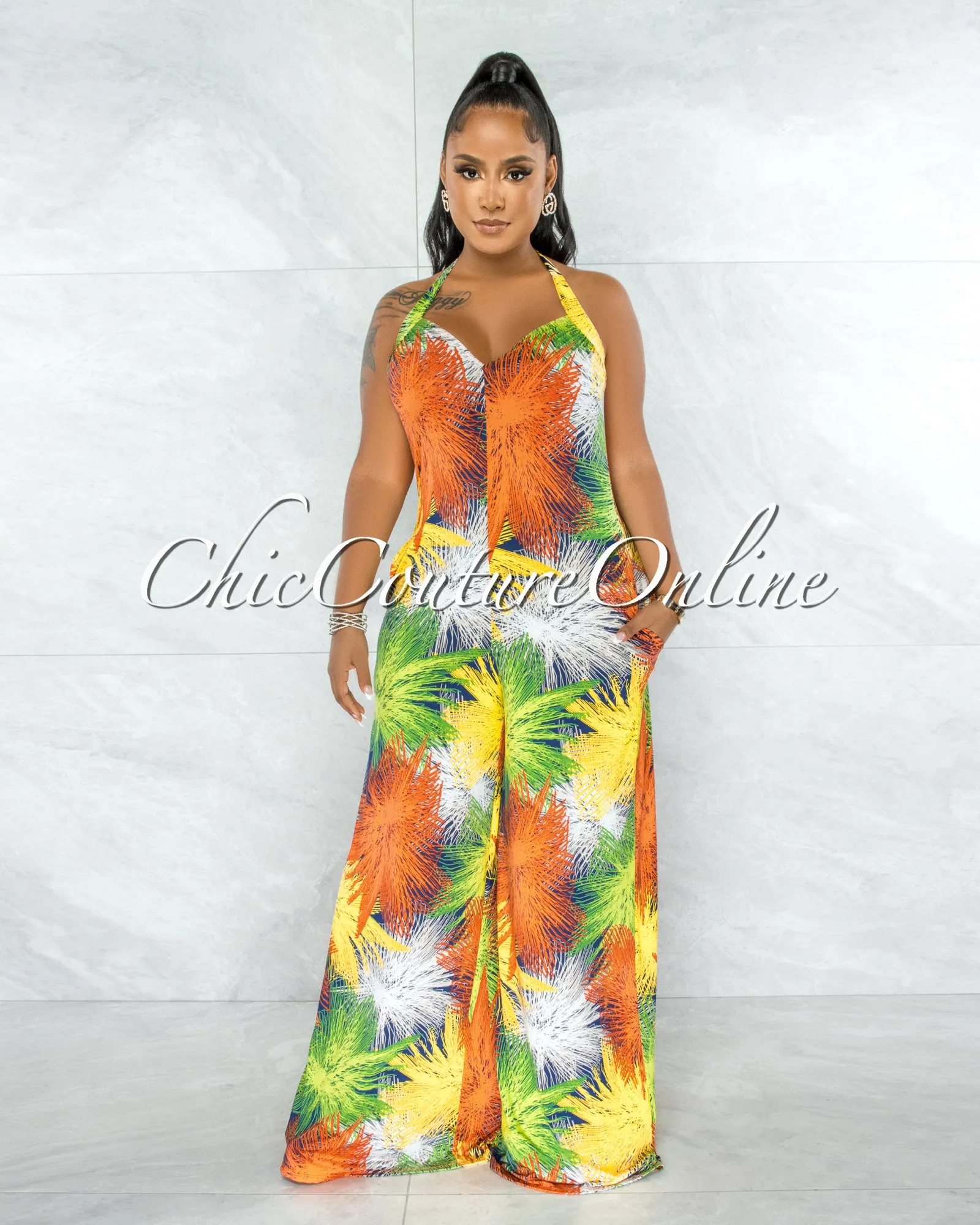 *Karida Multi-Color Print Halter Wide Legs Jumpsuit sold by Chic Couture