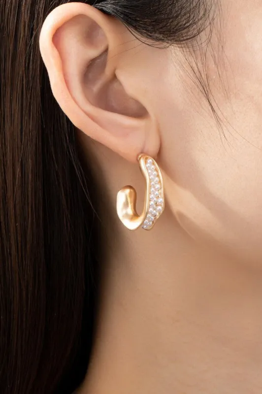 Kamala Hammered C hoop with pave pearls sold by Chic Couture