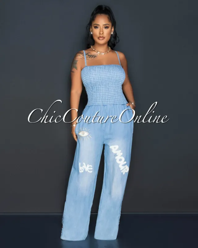 Jeanine Light Blue Smocked Top Graphics Chambray Jumpsuit sold by Chic Couture