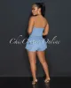 *Molara Light Denim Strapless Cargo Romper sold by Chic Couture