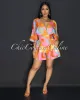 Mae Pink Multi-Color Print Romper sold by Chic Couture
