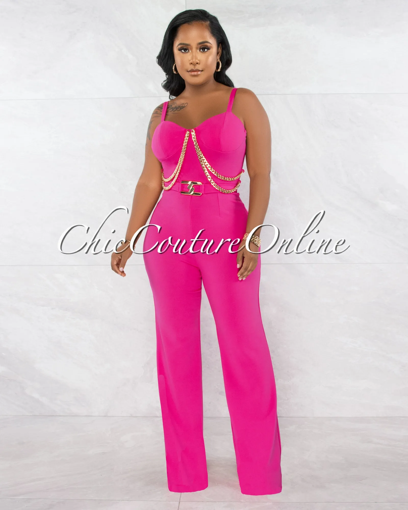 *Nolanie Fuchsia Gold Link & Buckle Accent Jumpsuit sold by Chic Couture