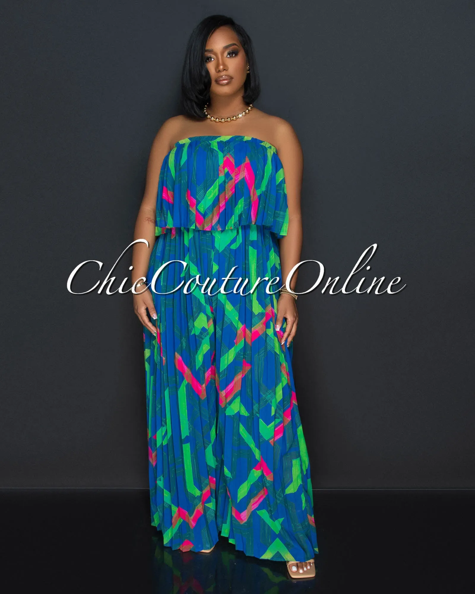 *Magalie Royal Blue Print Strapless Pleated Jumpsuit sold by Chic Couture