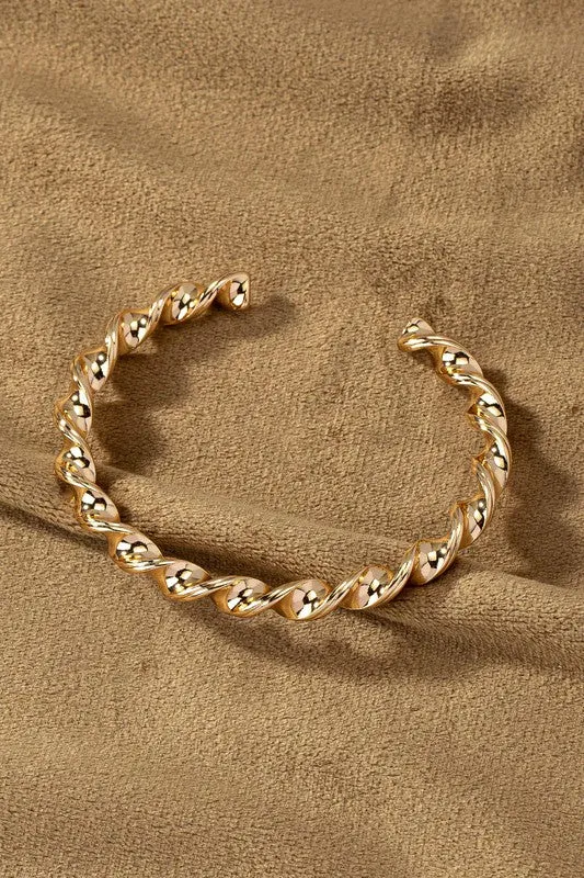 Maryanne Gold Twisted Cuff Bracelet sold by Chic Couture product image thumbnail 2