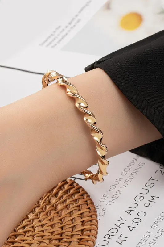 Maryanne Gold Twisted Cuff Bracelet made by Chic Couture