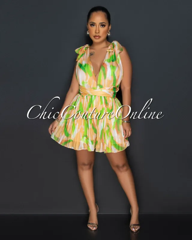 Neeva Green Orange Print Shimmer Pleated Romper sold by Chic Couture
