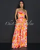 Fayna Tomato Mustard Smocked Top Jumpsuit sold by Chic Couture