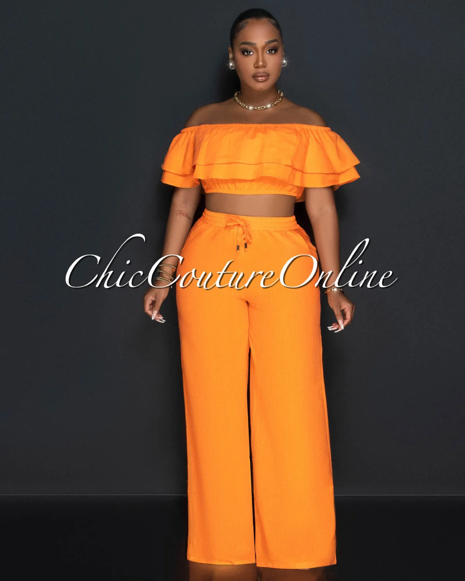 *Yuri Orange Ruffle Crop Top & Wide Pants Set sold by Chic Couture