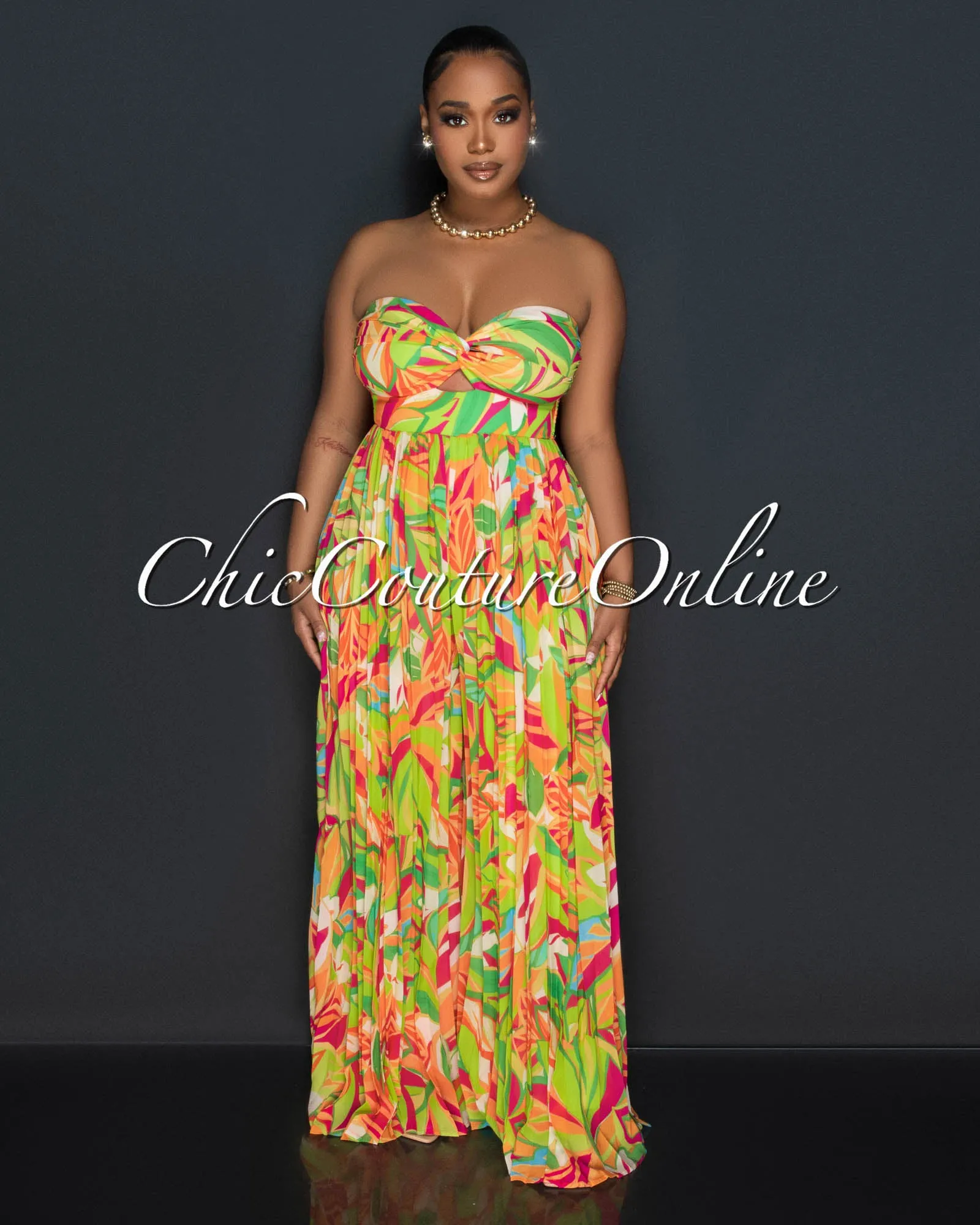 Rita Orange Green Print Bust Keyhole Pleated Jumpsuit sold by Chic Couture