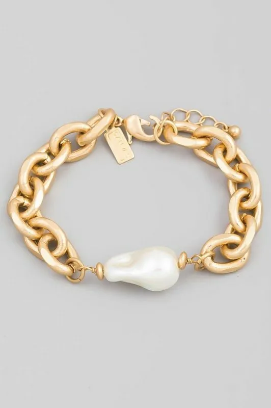 Lane Gold Pearl Charm Chain Bracelet sold by Chic Couture