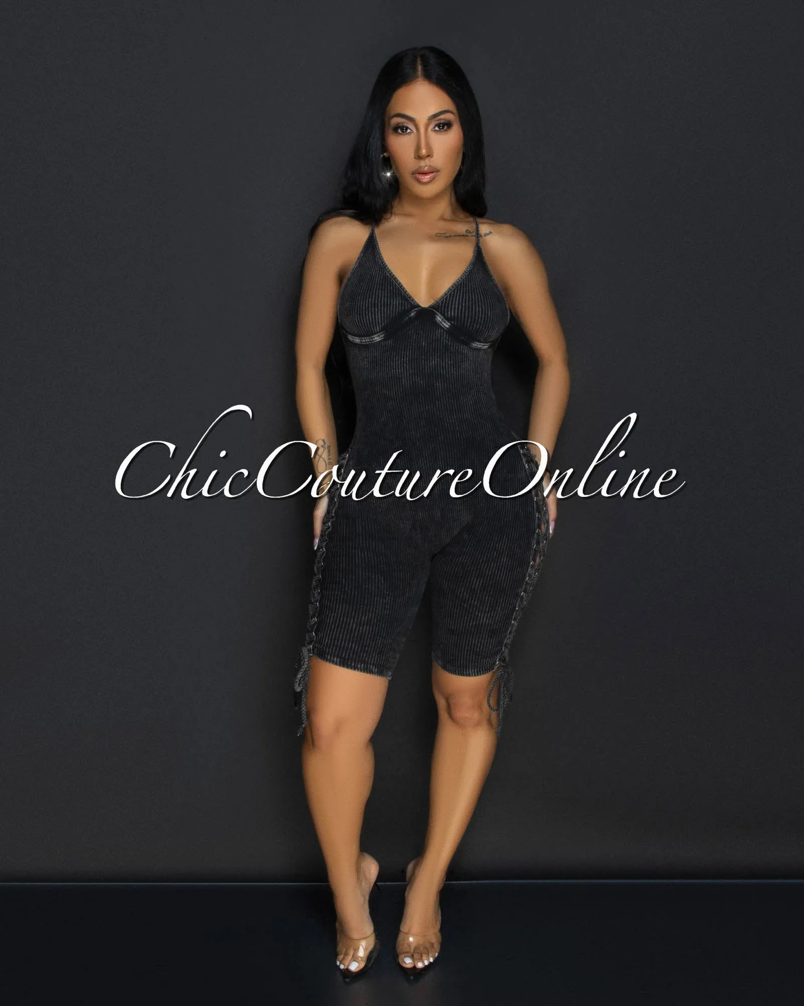 Daya Heather Black Ribbed Lace-Up Sides Romper sold by Chic Couture