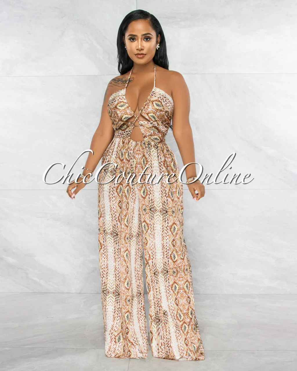 *Gusty Brown Snake Print Lace-Up Satin Jumpsuit sold by Chic Couture