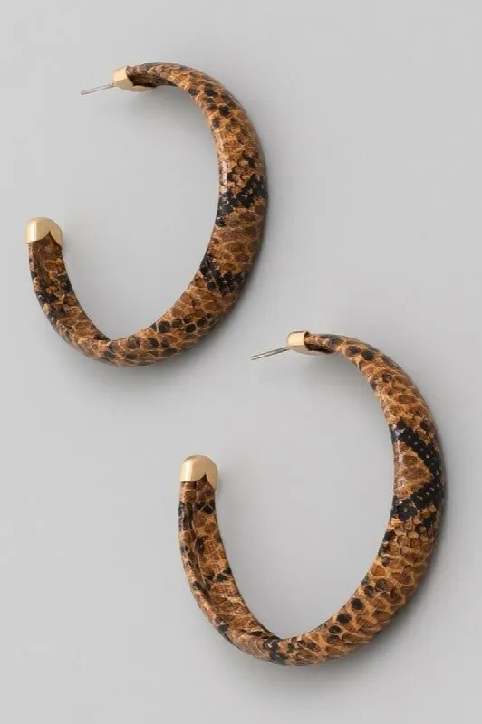 *Jiggy Brown Snake Print Hoop Earrings sold by Chic Couture