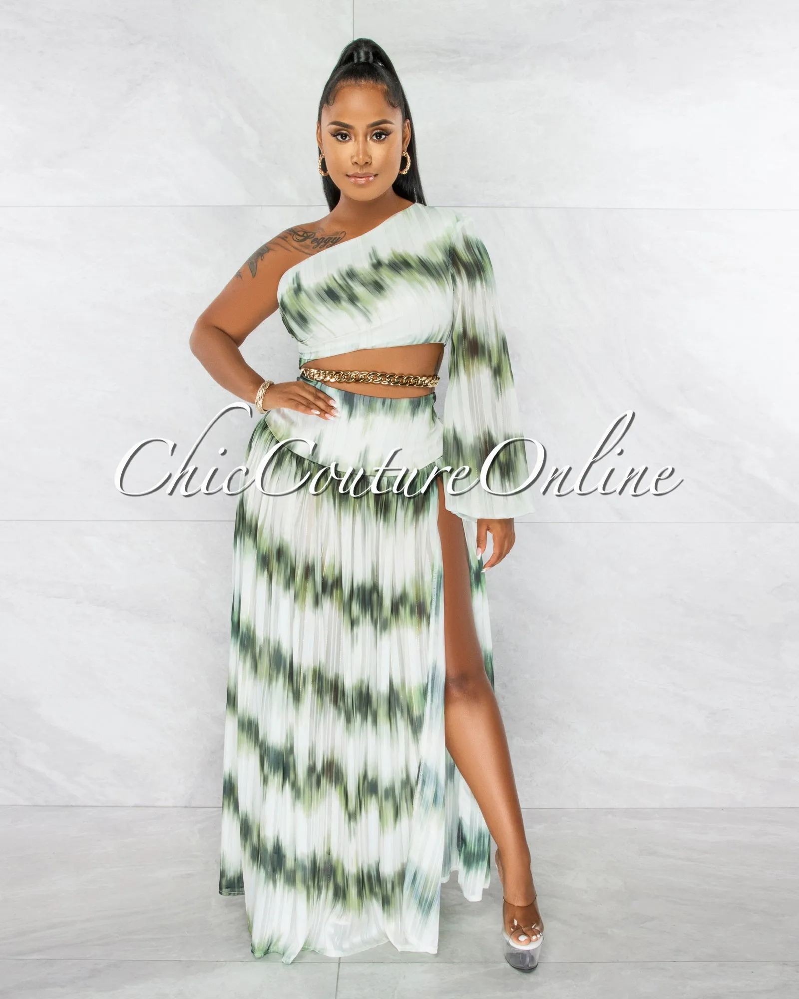 *Roxanne Green White Gold Shimmer Chain Belt Cut-Out Maxi Dress sold by Chic Couture