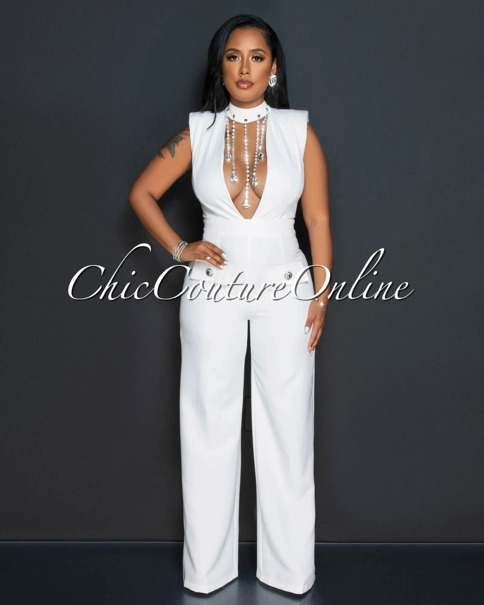 *Dionne Off-White Bust Rhinestones Accent Jumpsuit sold by Chic Couture