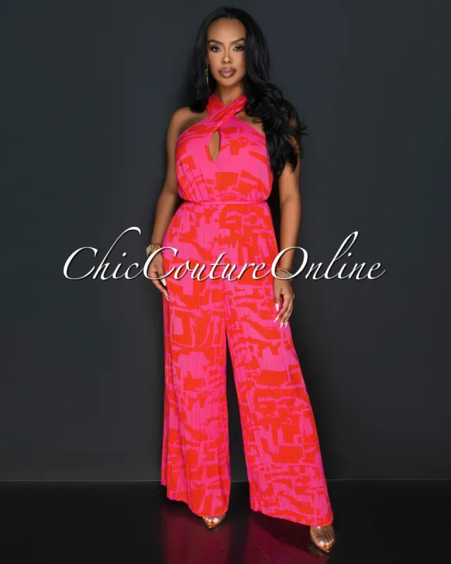 *Anara Orange Fuchsia Print Cross Neckline Pleated Jumpsuit sold by Chic Couture