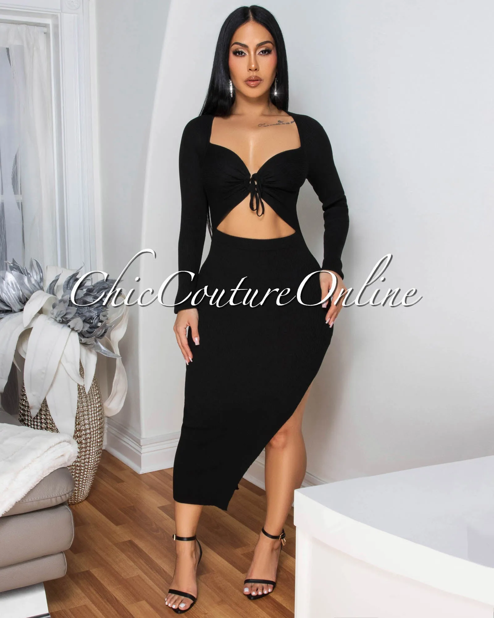 *Jaadia Black Ribbed Cut-Out Bust Midi Dress sold by Chic Couture