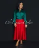 *Mallea Red Textured Silky Skirt sold by Chic Couture