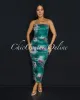 Skylar Green Multi-Color Print Ruched Midi Dress sold by Chic Couture