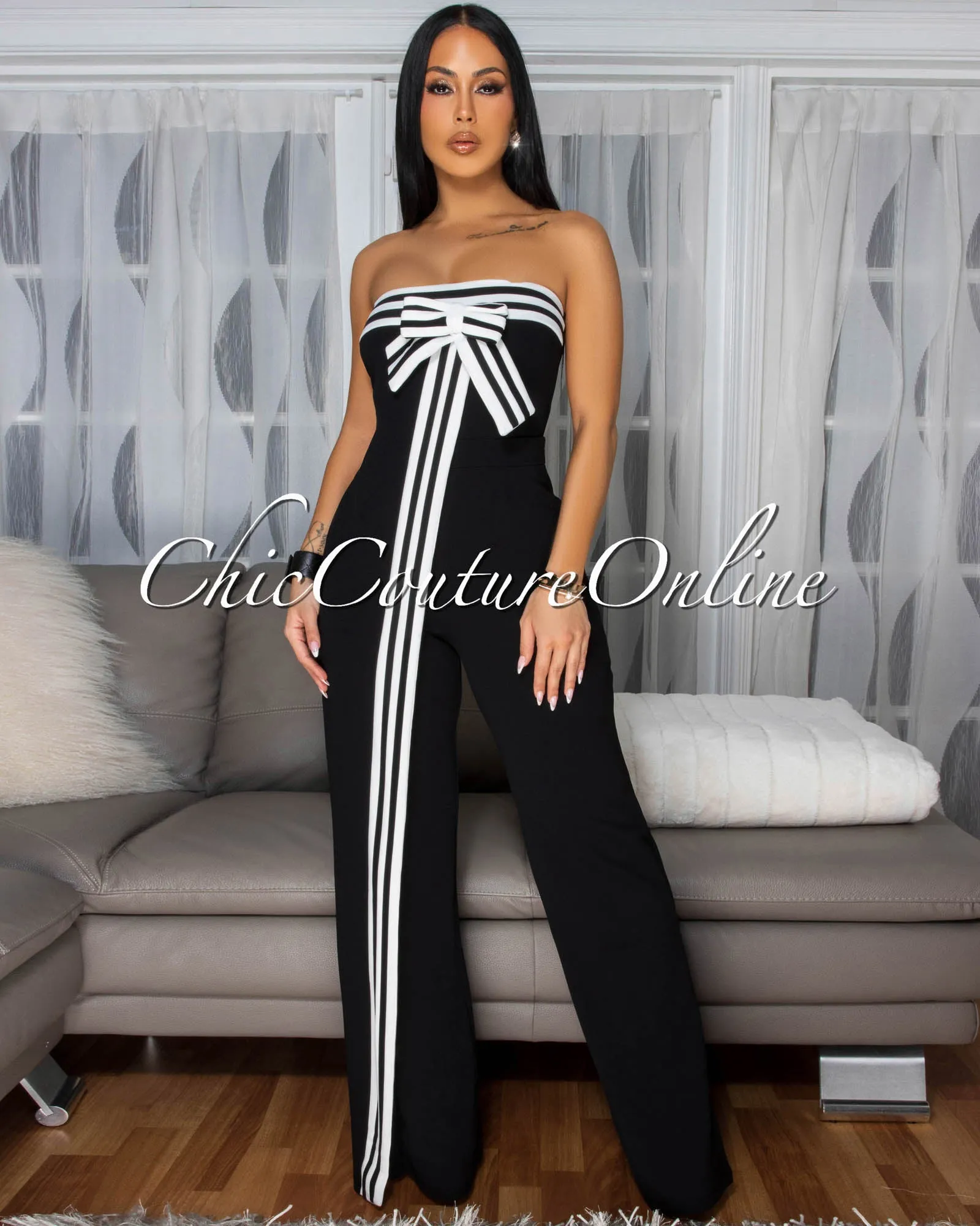 Bendie Black Bow Accent Strapless Jumpsuit (SHIPS 3/10) sold by Chic Couture