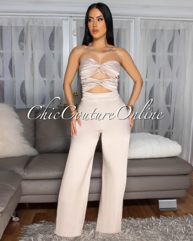*Verna Champagne Cut-Out Front Jumpsuit sold by Chic Couture