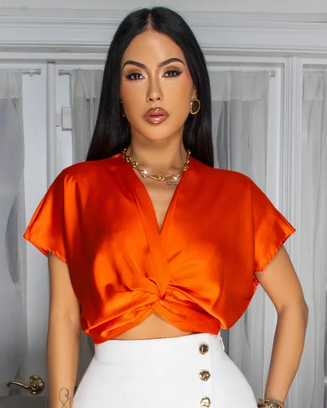 Rexa Orange Knot Front Silky Top sold by Chic Couture