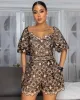 Neekam Nude Black Lace Romper sold by Chic Couture