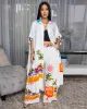 Miami Cream Multi-Color Print Maxi Dress sold by Chic Couture