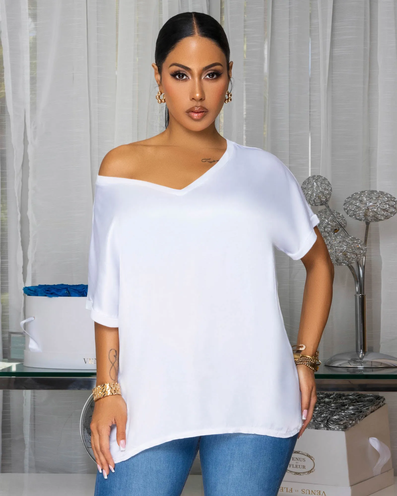 Sannela White Silky V-Neckline Top sold by Chic Couture