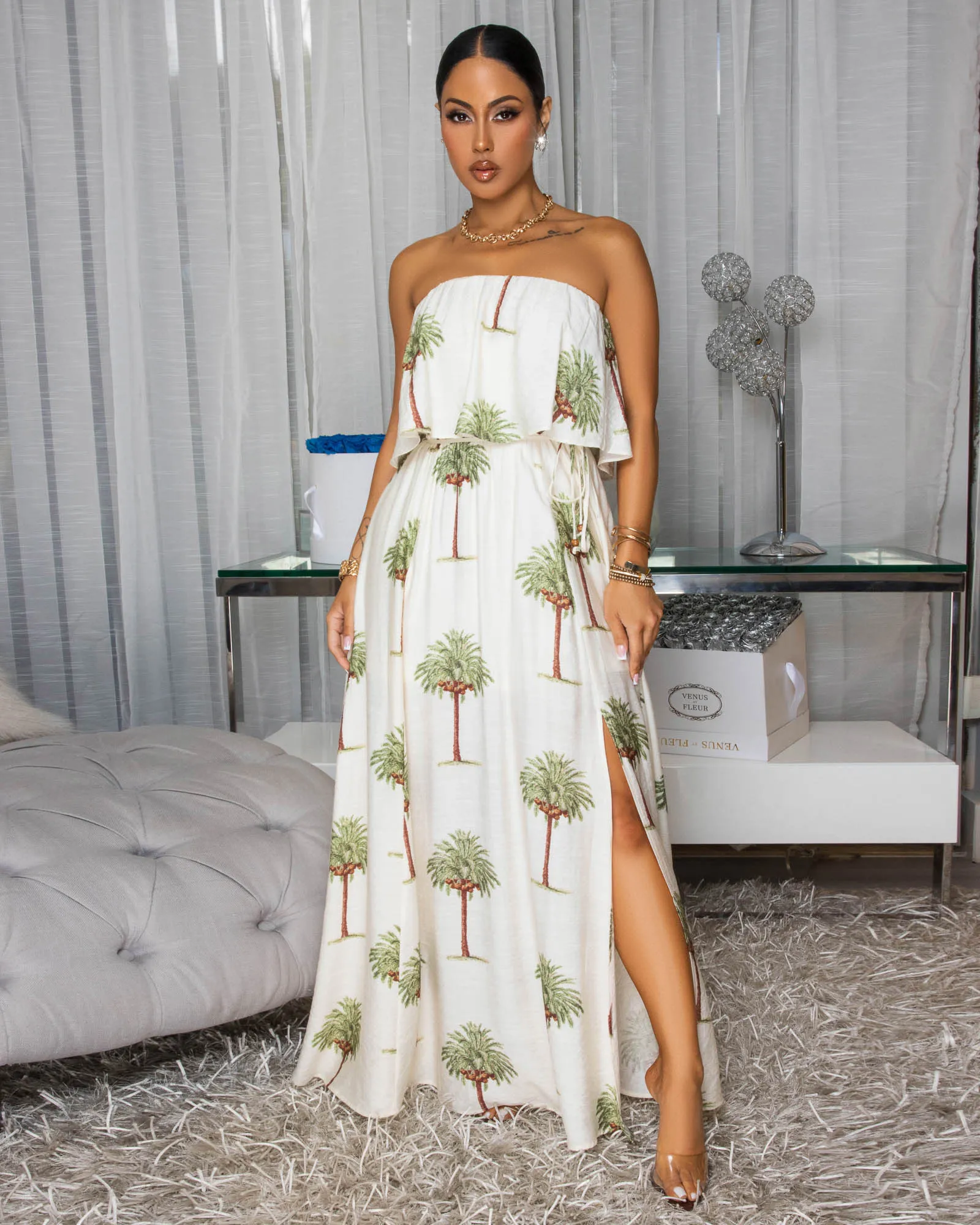 Lani Cream Palm Print Strapless Maxi Dress sold by Chic Couture