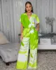 Darling Green Off-White Print Jumpsuit sold by Chic Couture