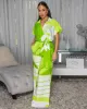 Darling Green Off-White Print Jumpsuit sold by Chic Couture
