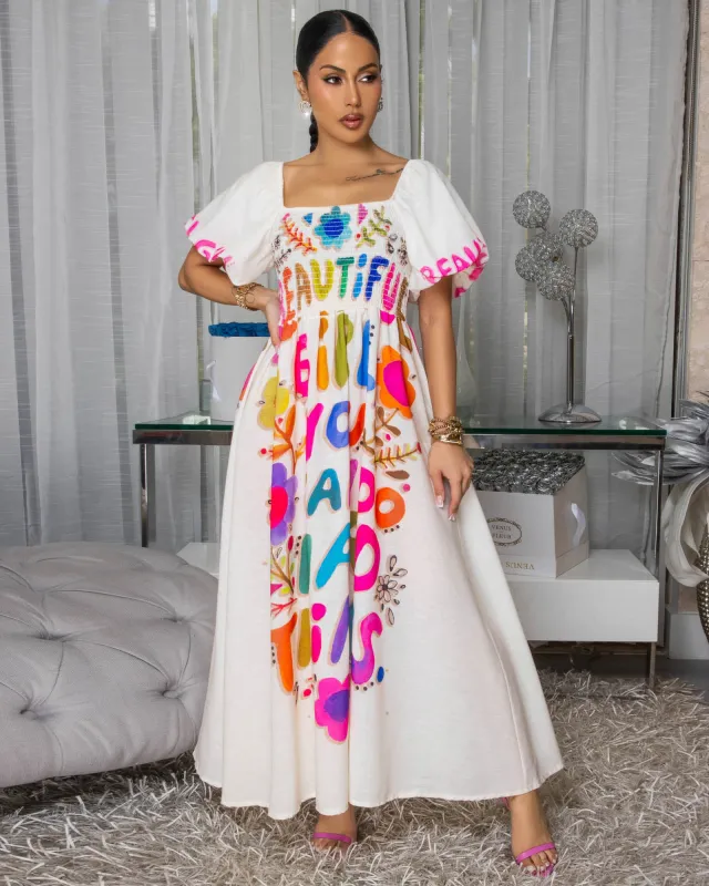 Eloise Cream Multi-Color Graphic Print Maxi Dress sold by Chic Couture