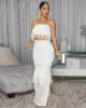Avaya Ivory Tassel Crop Top & Skirt Set sold by Chic Couture