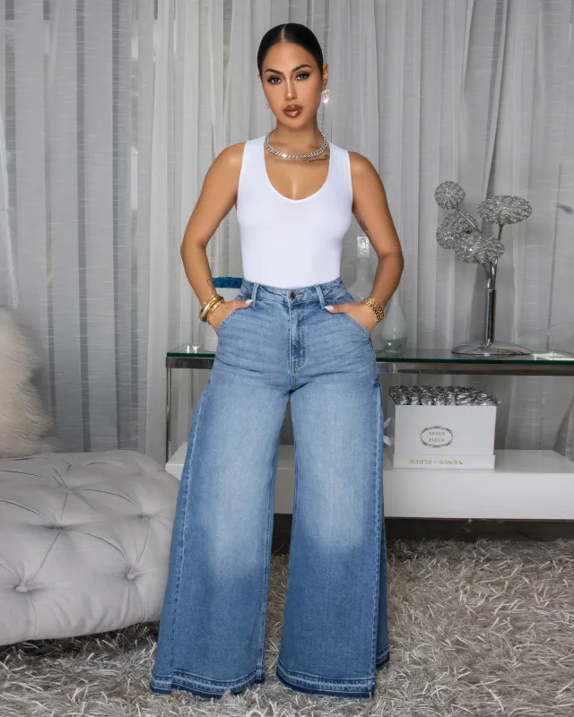 Dolce Light Blue Denim Bell Bottoms Jeans sold by Chic Couture
