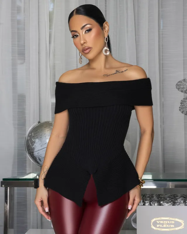 Nichelle Black Ribbed Peplum Sweater Top sold by Chic Couture