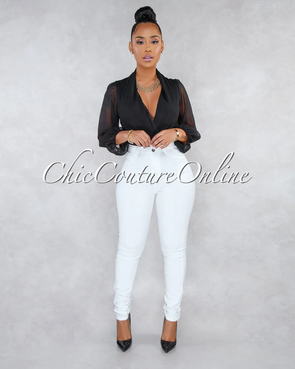 *Dariel White Denim High-Waist Skinny Jeans sold by Chic Couture