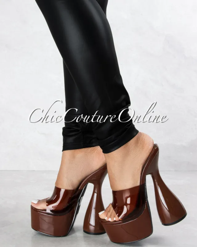 *Inji Brown Clear Upper Platform Statement Heels sold by Chic Couture