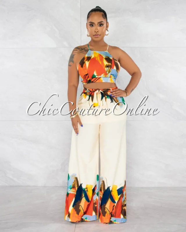 *Cyrano Ivory Orange Print Top & Wide Pants Set sold by Chic Couture