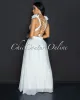 *Cianna White Ruffle Lace-Up Back Maxi Dress sold by Chic Couture