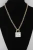 Jaden Gold Bulky Lock Pendant Chain Necklace sold by Chic Couture