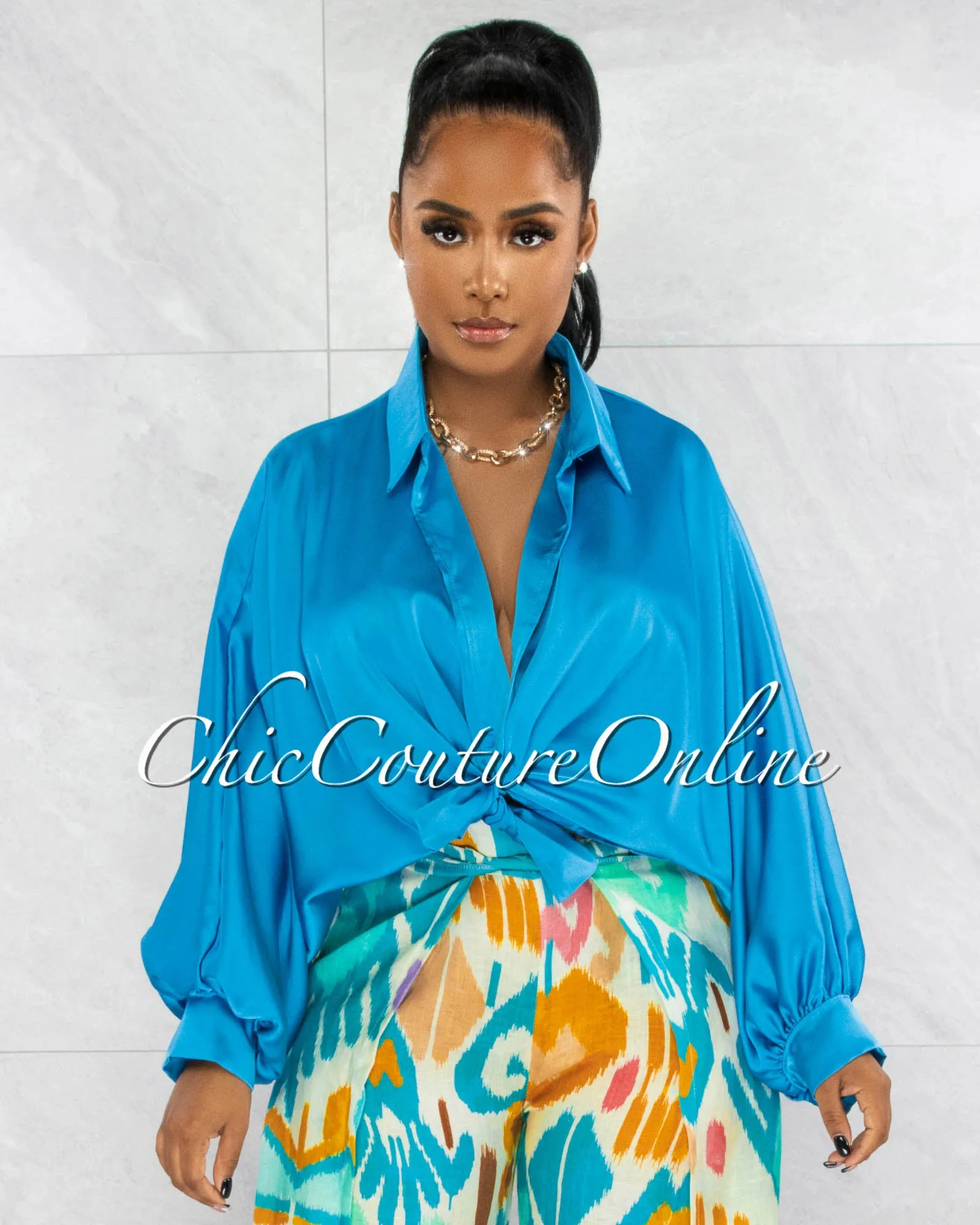 *Pilar Turquoise Wide Sleeves Silky Blouse sold by Chic Couture